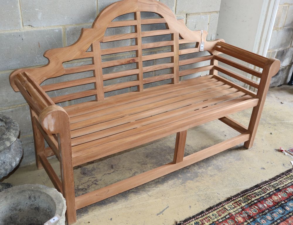 A teak Lutyens style garden bench, W.153cm, D.60cm, H.106cm